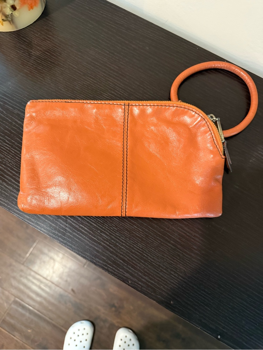 HOBO Orange Leather Wristlet Clutch with Circular Wrist Strap